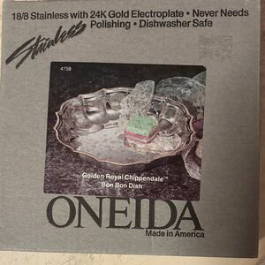 Oneida Gold-Trimmed Stainless Dish